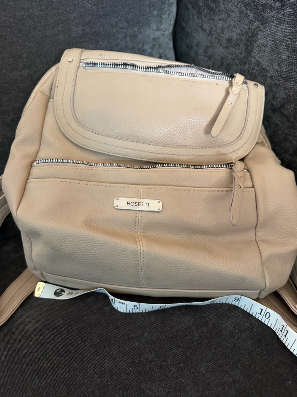 Rosetti Light Beige Pebbled Leather Backpack with Front Zip Pocket